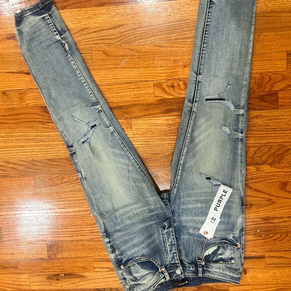 blue ripped purple jeans